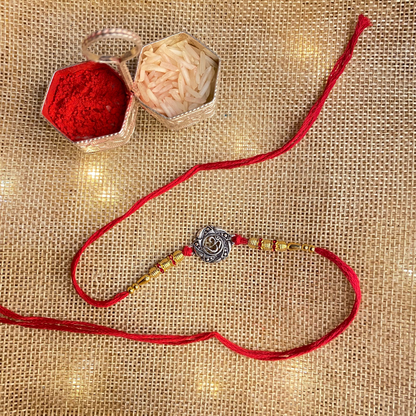 Artisanal Silver Rakhi  AUM in Mandala Motif - Top View