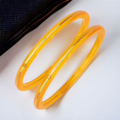 "Top view of Handmade 22kt (916) Yellow Gold Pola Bangles"