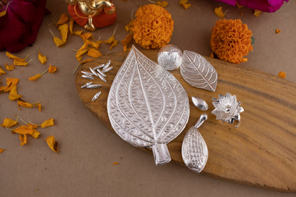 97%-99% Pure Silver Puja, Pooja Item Set | Combo of Pipal Paan, Tulsi, Laung, Supari, Flower, Badam, Elaichi and 11 pcs of Rice for Puja, Gift and Mandir | Silver, Set of 8 Items