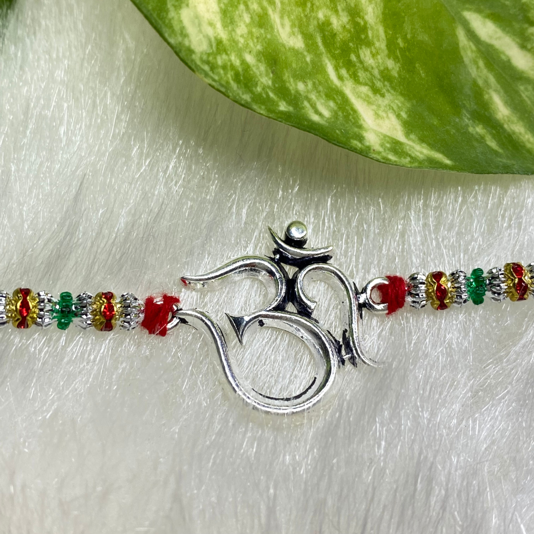 Pure Silver Rakhi for brother with Thread and Silver motif of Classic Om Top View