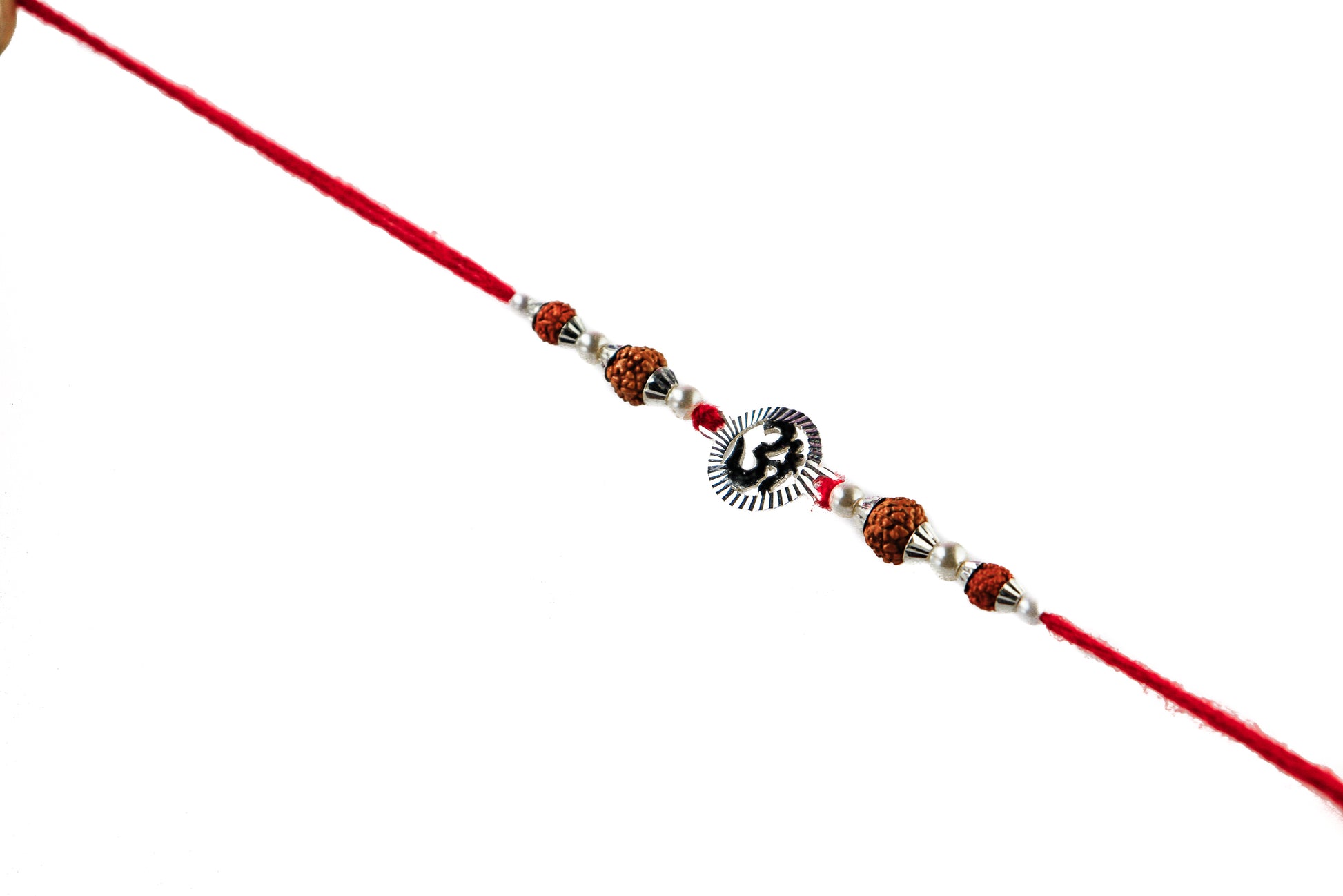 Traditional Silver Rakhi with Oval Om  Motif - White background