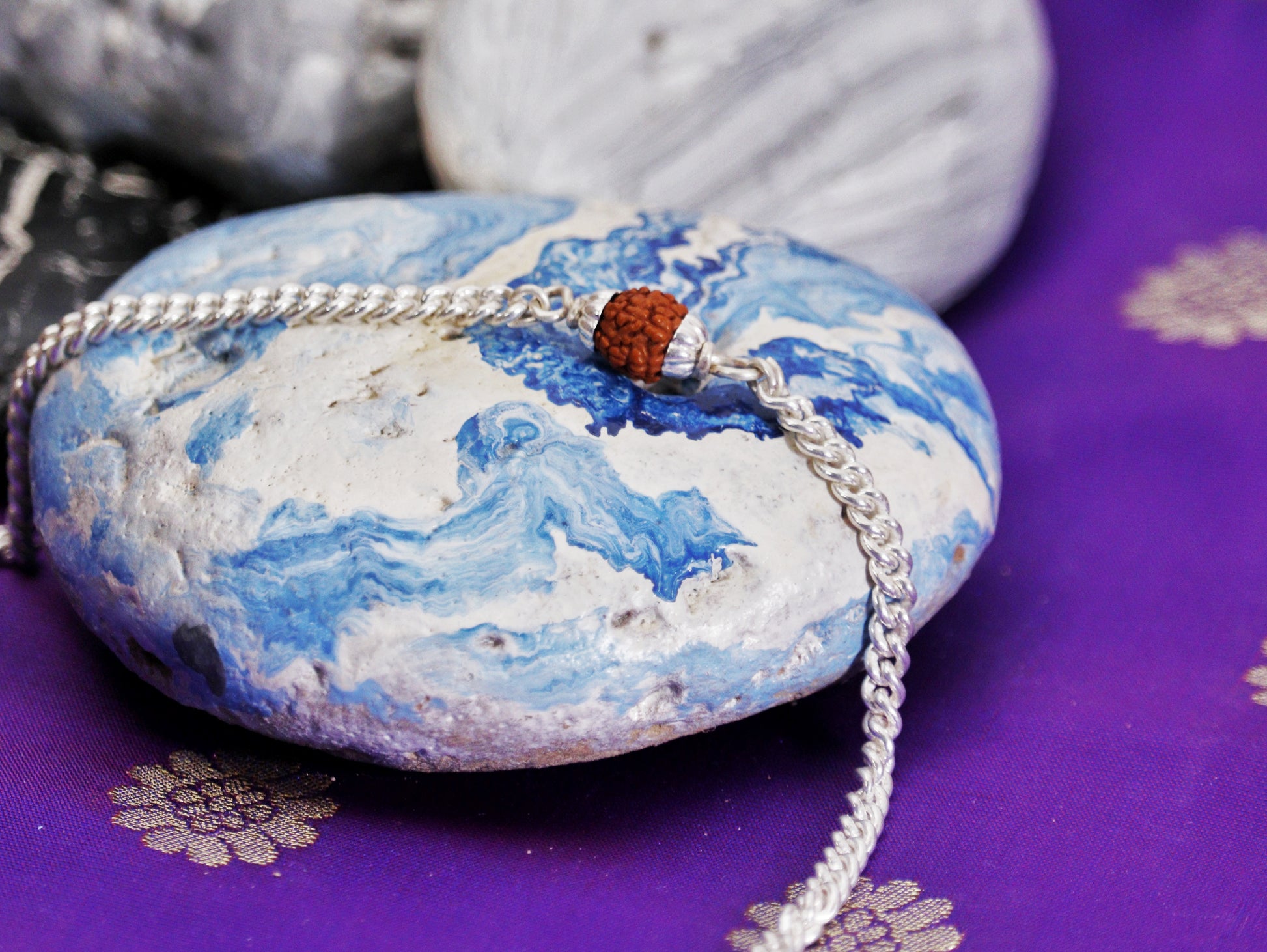 Silver Rakhi with Single Rudraksh in Centre Motif - Motif Close Up