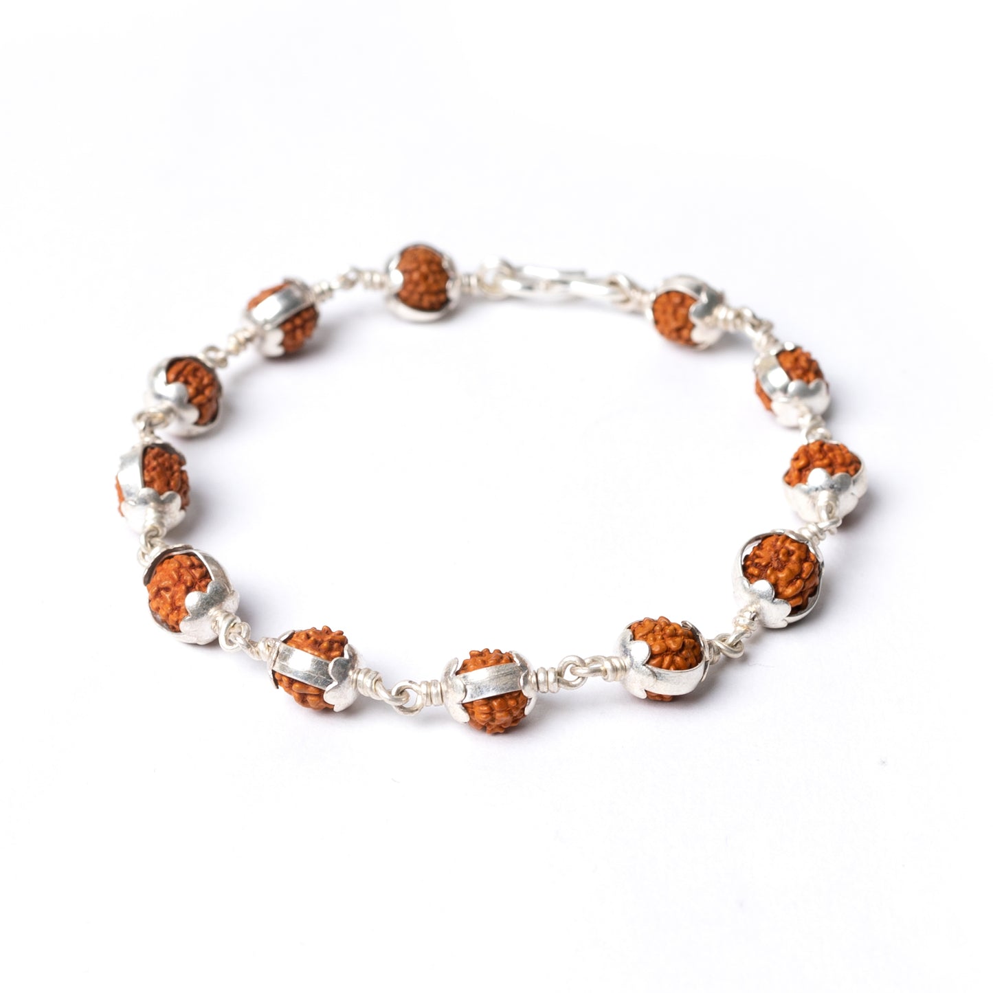 Silver Rudraksha Rakhi with Enclosed Rudraksh Motif - White background