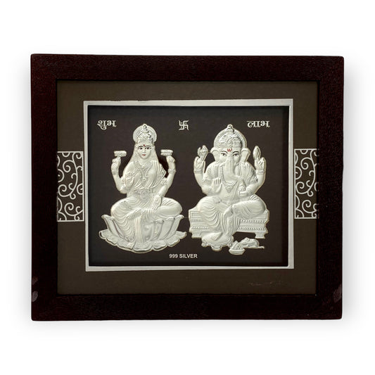 " Front view of exquisite 7x5 inch 999 pure silver Ganesh Laxmi frame by Hem Jewels®.	