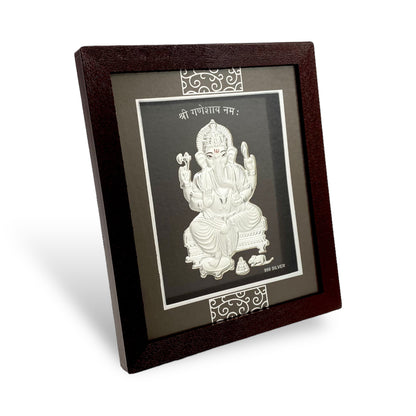 "Side view of exquisite 7x5 inch 999 pure silver Ganesh frame by Hem Jewels® showcasing its elegant design from the side."