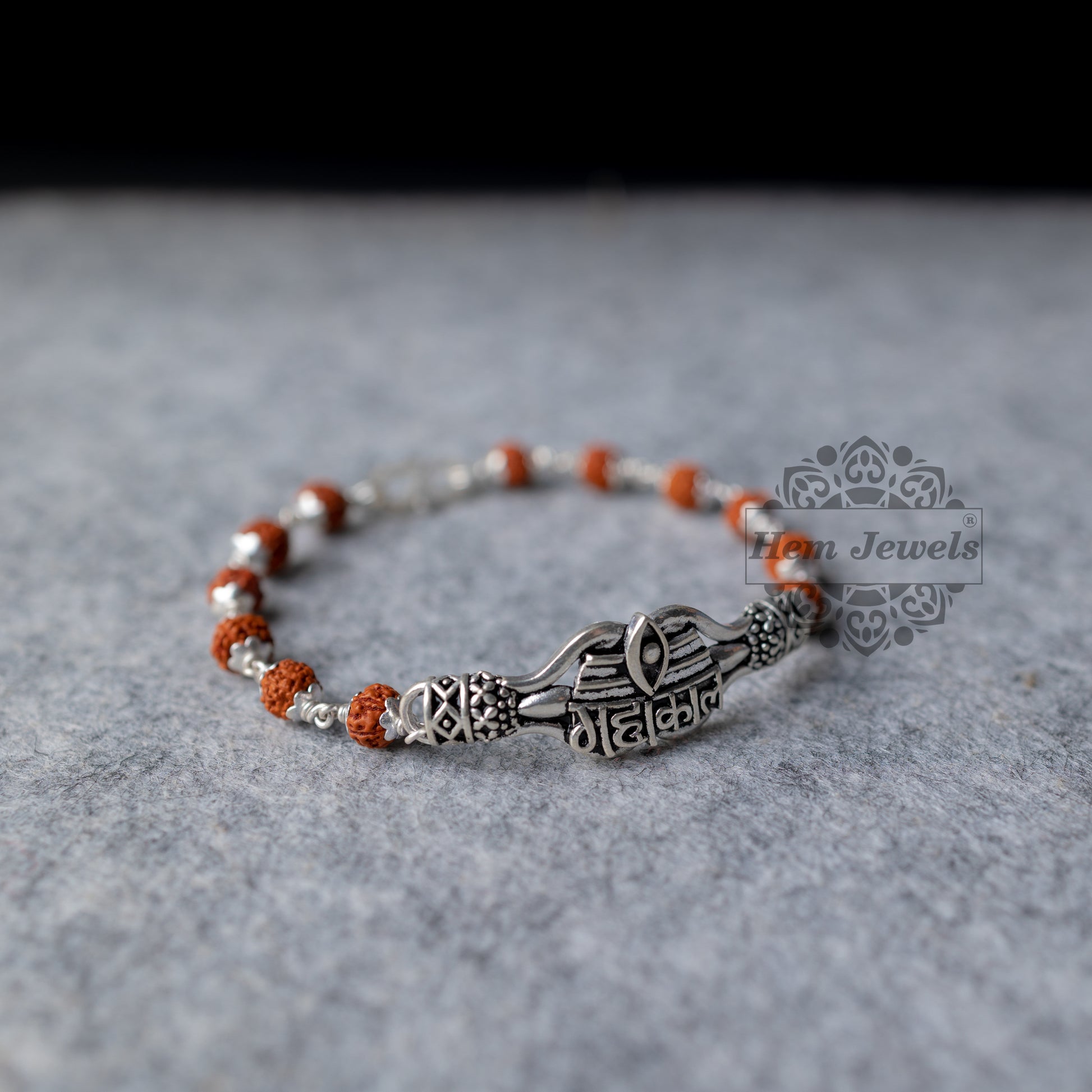 Silver Rudraksha Rakhi with Mahakal  Motif - Top View