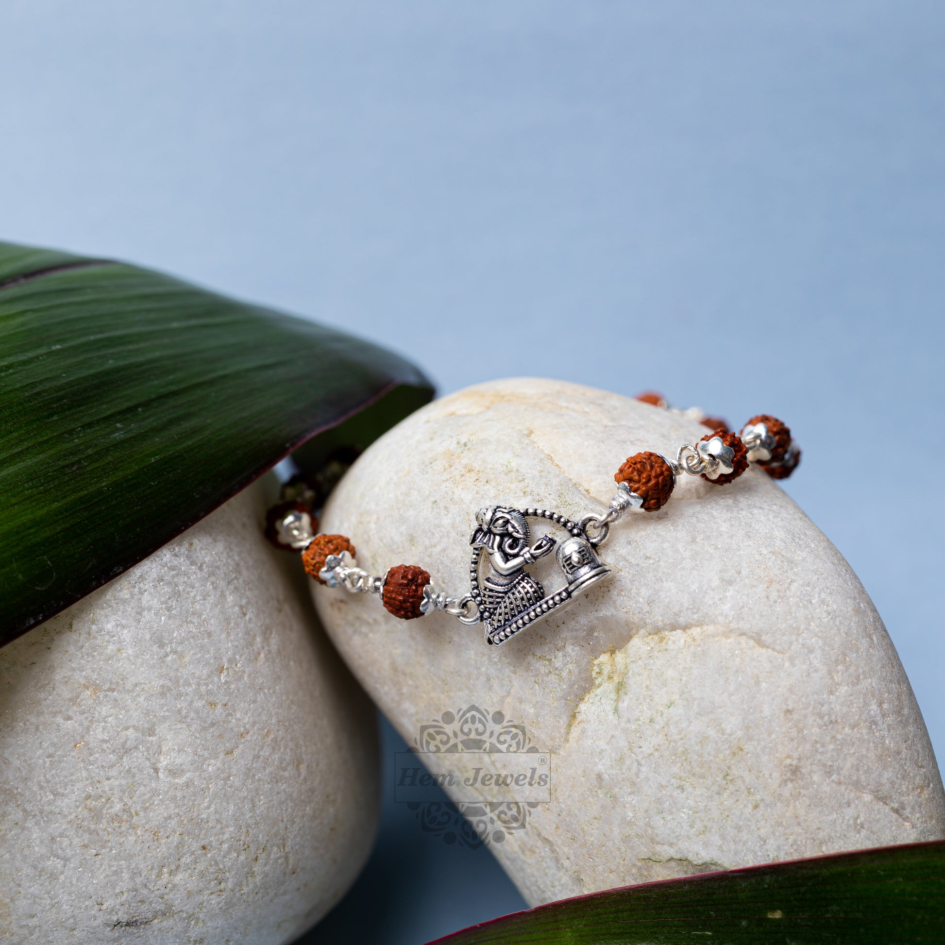 Silver Rudraksha Rakhi with Ganesh & Shivling Motif - Motif Close Up