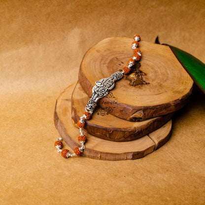 View showing Silver Rudraksha Rakhi with Mahakal  Motif