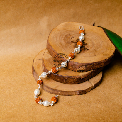 View showing Silver Rudraksha Rakhi with Pearl Design