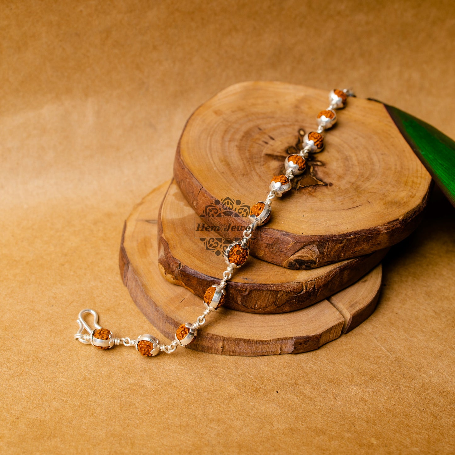 View showing Silver Rudraksha Rakhi with Enclosed Rudraksh Motif