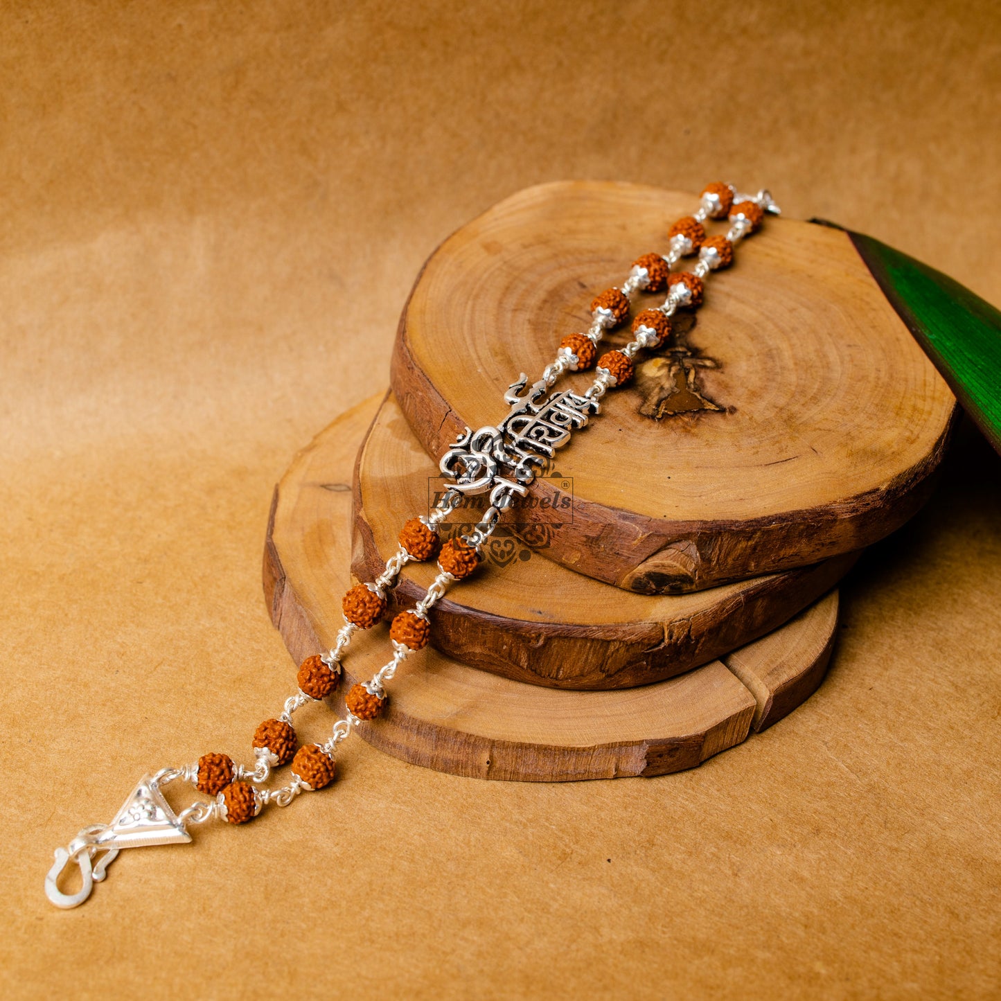 View showing Silver Rudraksha Rakhi with Om Trishul Motif