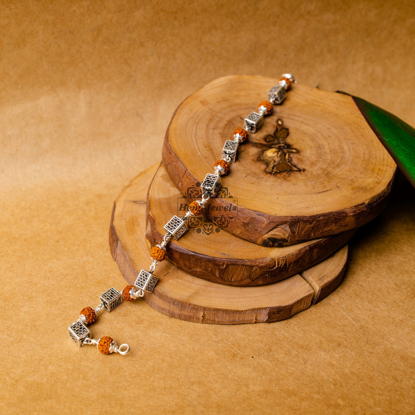 View showing Silver Rudraksha Rakhi with Cube Beads