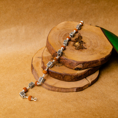 View showing Silver Rudraksha Rakhi with Cube Beads