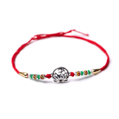 Traditional Silver Rakhi with Spiritual Om  Motif - White background