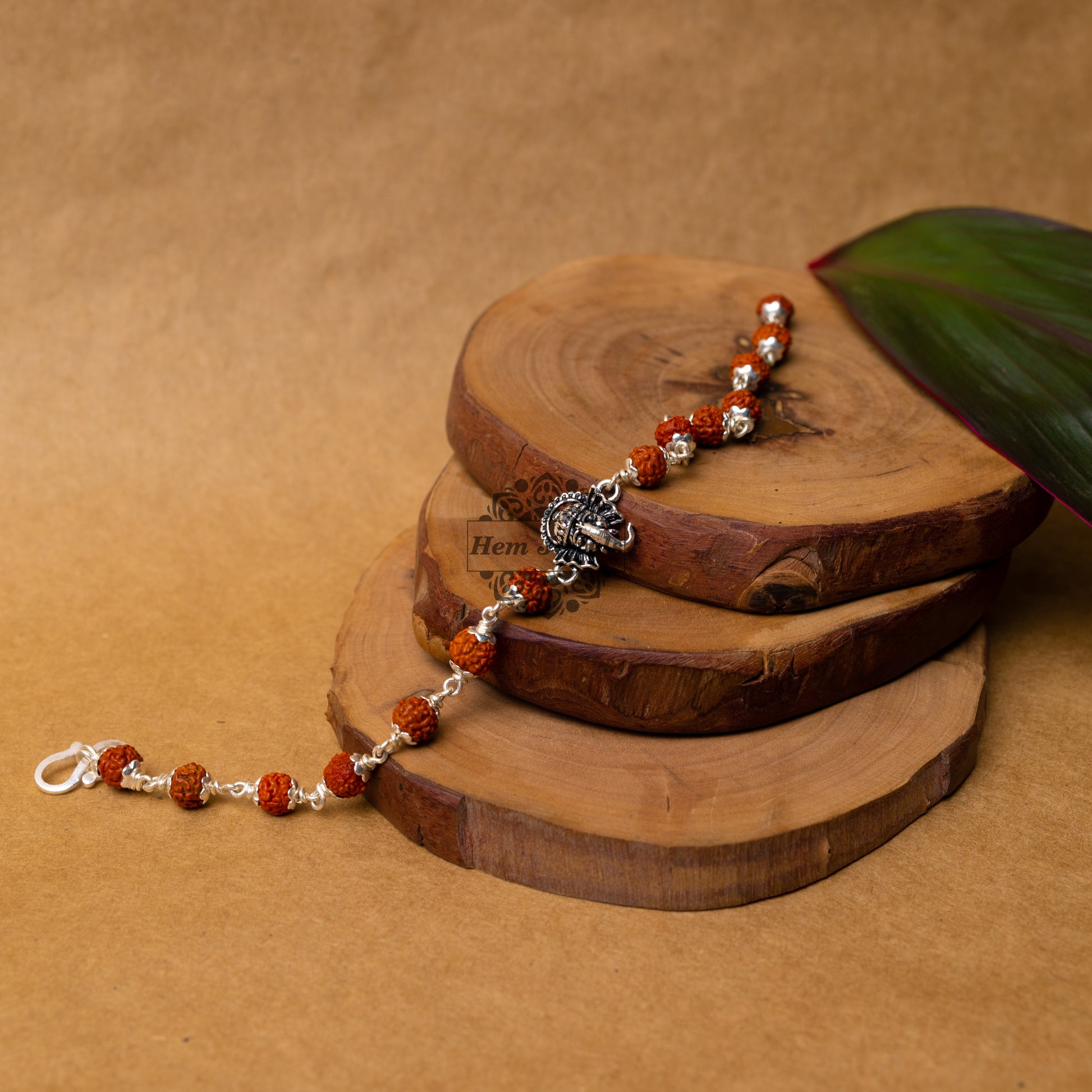 View showing Silver Rudraksha Rakhi with Ganesh Face Motif