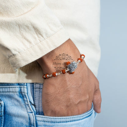 A man Silver Rudraksha Rakhi with Mahakaal with Shiva 3rd Eye Motif