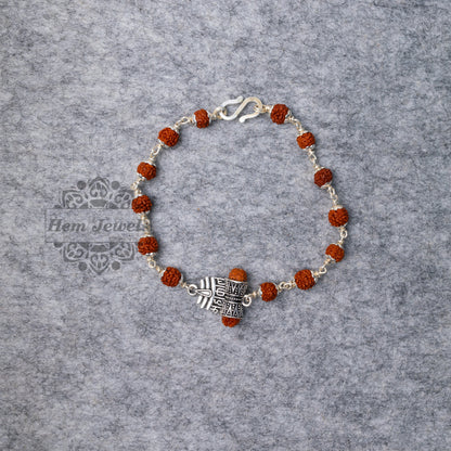 Silver Rudraksha Rakhi with Mahakaal with Shiva 3rd Eye Motif - Top View