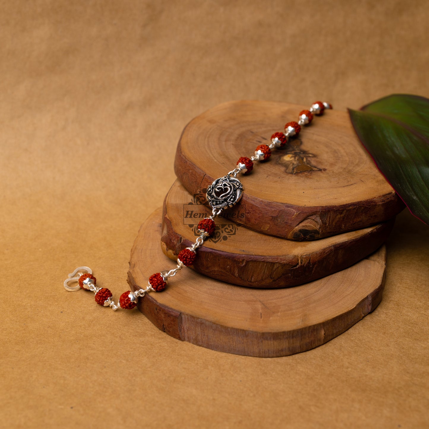 View showing Silver Rudraksha Rakhi with Om in Mandalan Motif