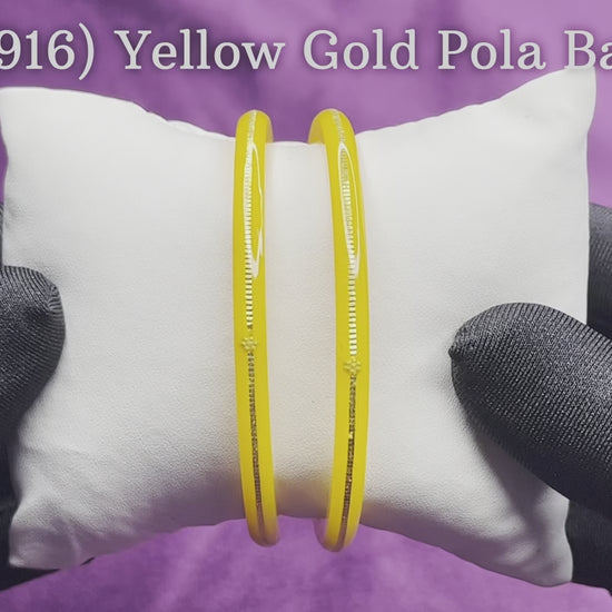 "Video showcasing Hem Jewels Gold Pola Bangles from various angles, highlighting exquisite craftsmanship and timeless elegance."