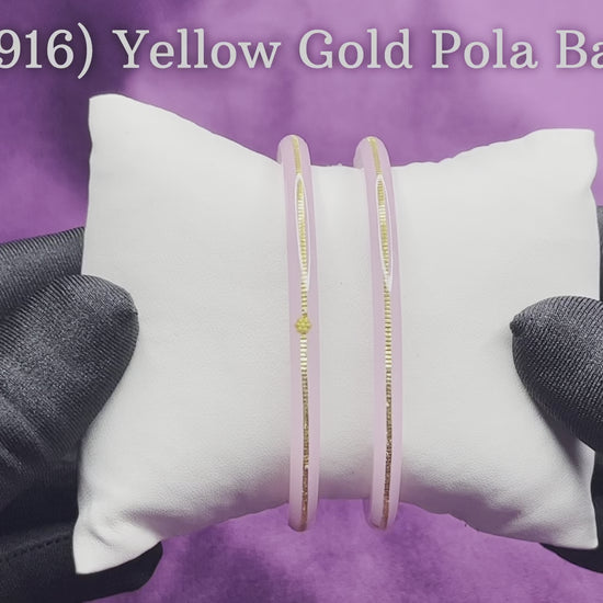 "Video showcasing Hem Jewels Gold Pola Bangles from various angles, highlighting exquisite craftsmanship and timeless elegance."