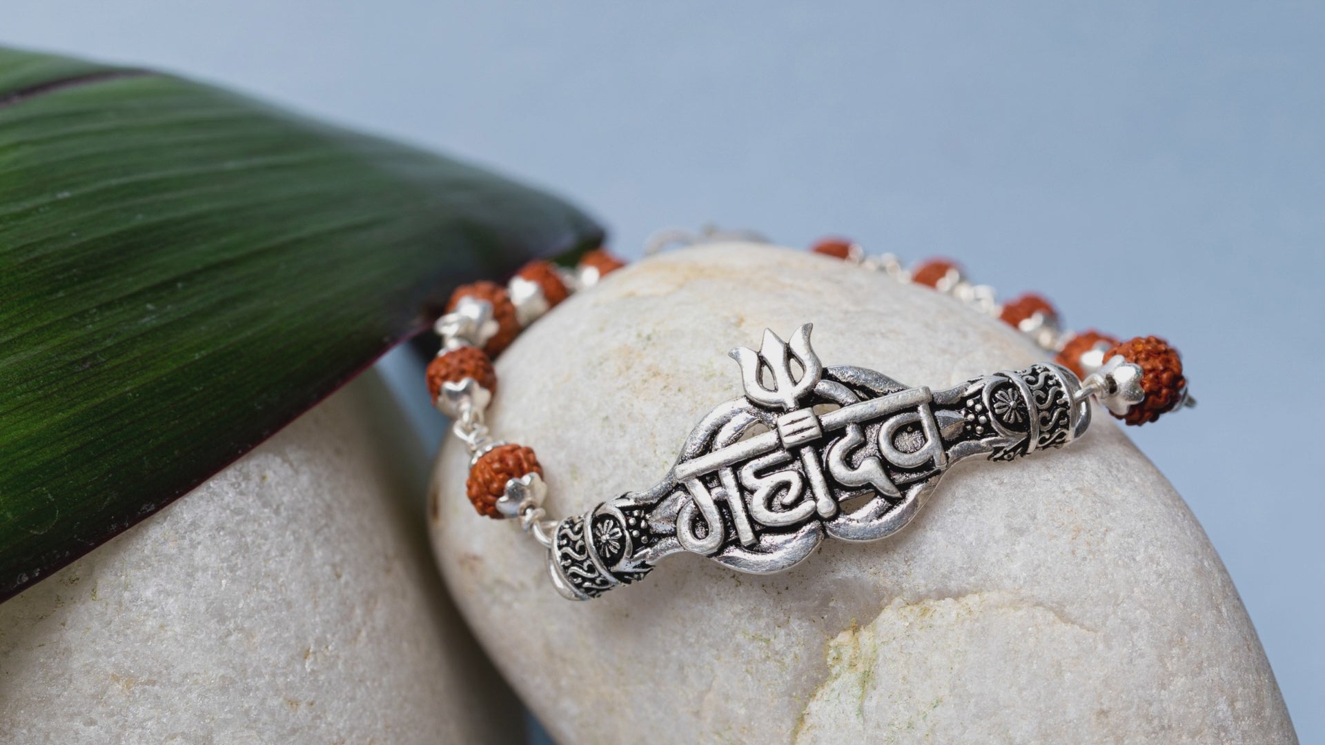 Video showing Silver Rudraksha Rakhi with Mahadev Motif and its use.