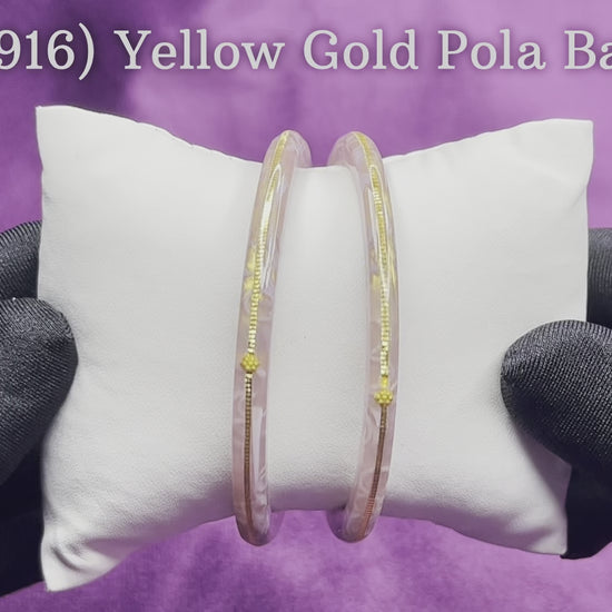 "Video showcasing Hem Jewels Gold Pola Bangles from various angles, highlighting exquisite craftsmanship and timeless elegance."