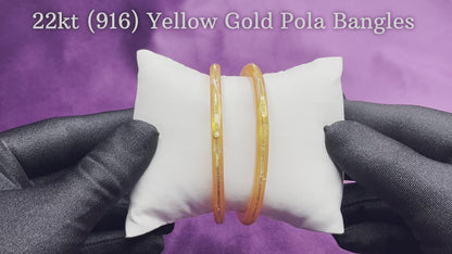 "Video showcasing Hem Jewels Gold Pola Bangles from various angles, highlighting exquisite craftsmanship and timeless elegance."