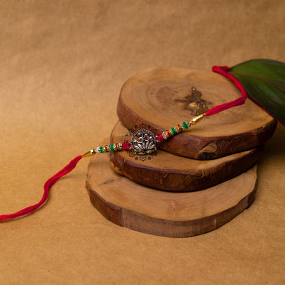 View showing Traditional Silver Rakhi with  Spiritual Om Motif