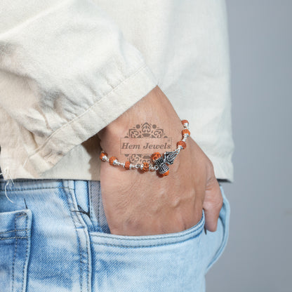 A man Silver Rudraksha Rakhi with Trishul with 3rd Shiva Eye Motif