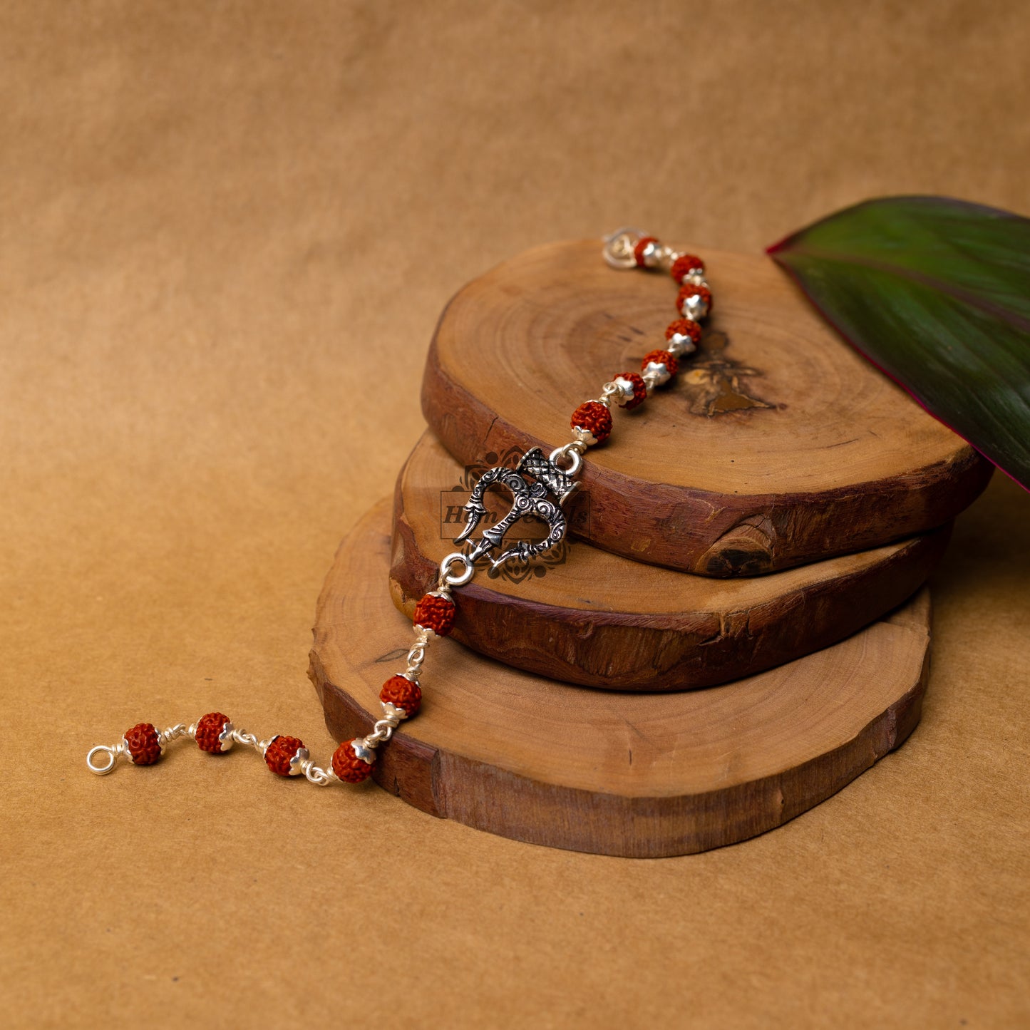 View showing Silver Rudraksha Rakhi with Trishul - Trident Motif